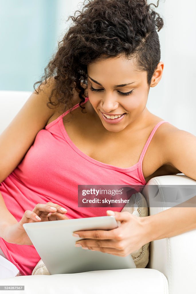 African American woman using touchpad.