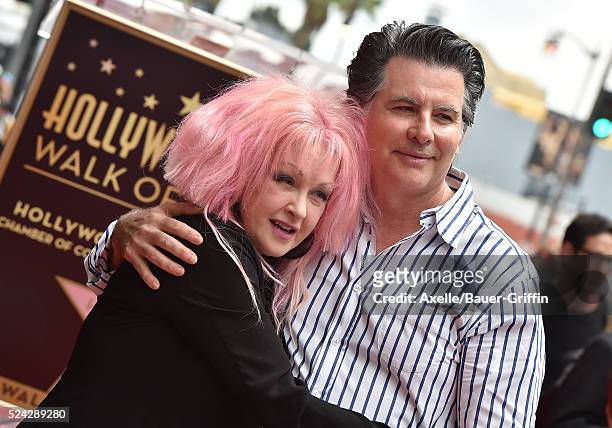 Singer Cyndi Lauper and David Thornton attend the ceremony honoring Cyndi Lauper and Harvey Fierstein with double star ceremony on the Hollywood Walk...