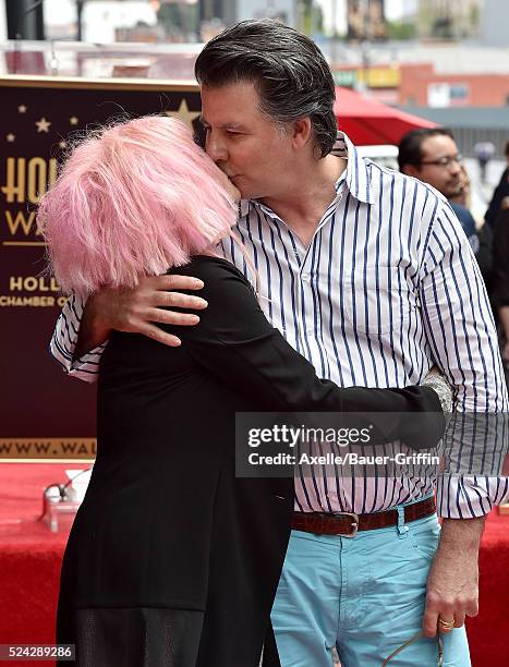 Singer Cyndi Lauper and David Thornton attend the ceremony honoring Cyndi Lauper and Harvey Fierstein with double star ceremony on the Hollywood Walk...