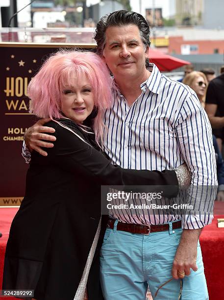 Singer Cyndi Lauper and David Thornton attend the ceremony honoring Cyndi Lauper and Harvey Fierstein with double star ceremony on the Hollywood Walk...