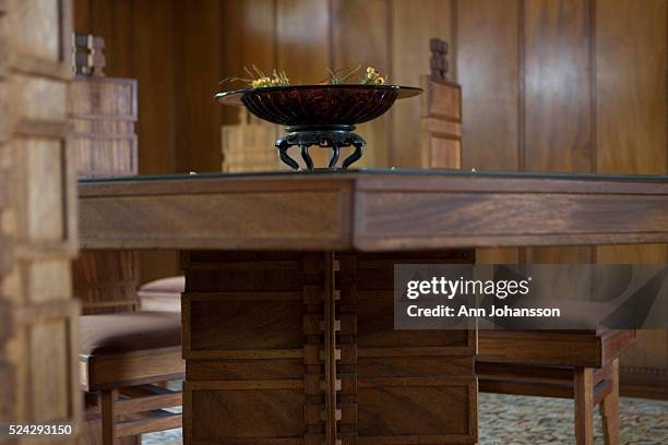 The dining area table and chairs are photographed in the Hollyhock House, by architect Frank Lloyd Wright, in Los Angeles, June 4, 2011. Wright also...