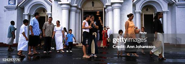 Worshippers exit the Mulivai Catholic Cathedral in Apia, in Western Samoa.