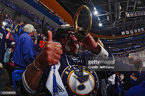 St. Louis Blues fan celebrates after defeating the Chicago Blackhawks 3-2 Game Seven of the Western Conference First Round during the 2016 NHL...