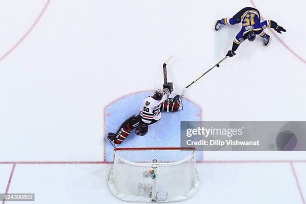 Robby Fabbri of the St. Louis Blues shoots the puck against Corey Crawford of the Chicago Blackhawks in Game Seven of the Western Conference First...