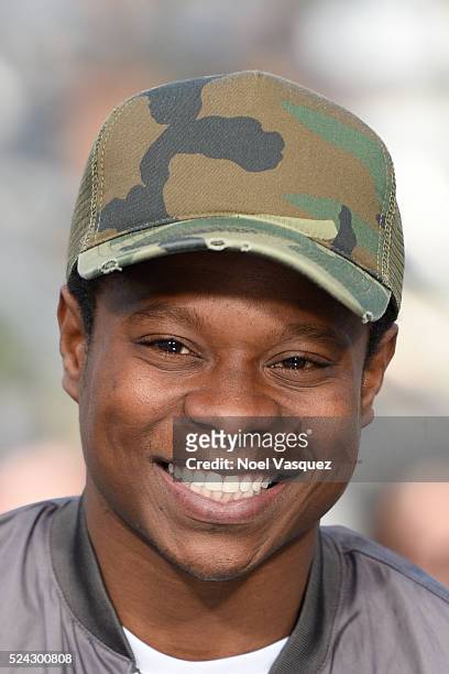 Jason Mitchell visits "Extra" at Universal Studios Hollywood on April 25, 2016 in Universal City, California.