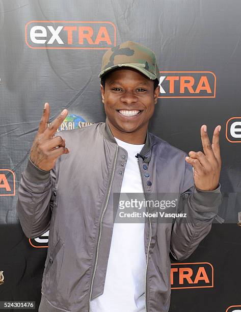Jason Mitchell visits "Extra" at Universal Studios Hollywood on April 25, 2016 in Universal City, California.