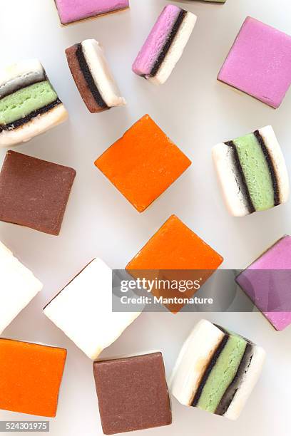 colourful liquorice candy on white - allsorts stock pictures, royalty-free photos & images