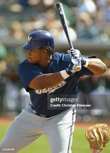 Prince Fielder of the Milwaukee Brewers bats against the Oakland Athletics during the MLB spring training game at Phoenix Municipal Stadium on March...