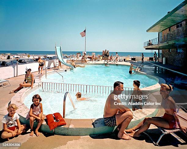 Tourists in Swimming Pool at Monterey Motel