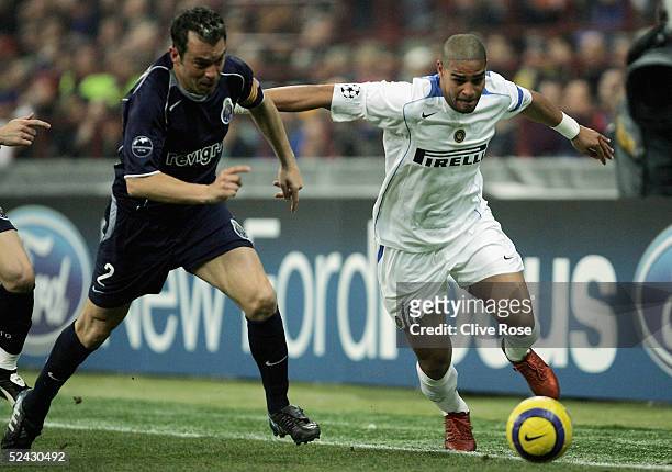 Adriano of Inter Milan battles with Jorge Costa of Porto during the UEFA Champions League match between Inter Milan and FC Porto at the San Siro...