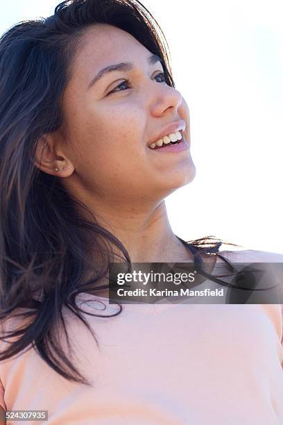 teenager girl looking away from the câmera - câmera stock pictures, royalty-free photos & images