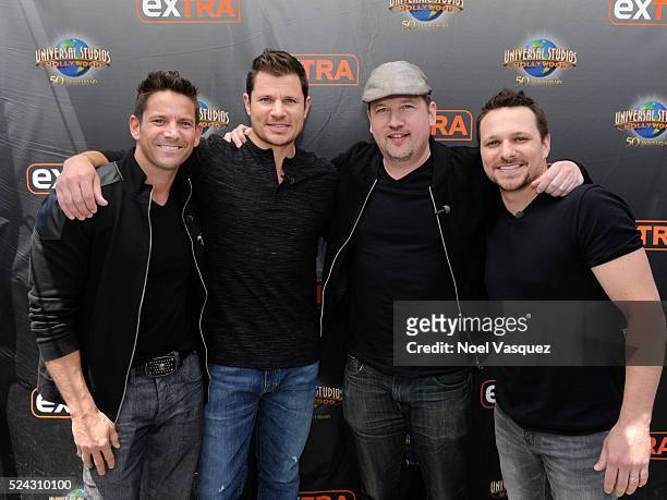 Jeff Timmons, Nick Lachey, Justin Jeffre and Drew Lachey of 98 Degrees visit "Extra" at Universal Studios Hollywood on April 25, 2016 in Universal...