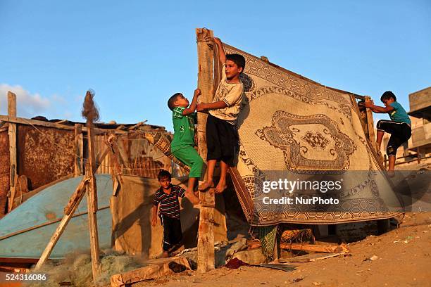 Palestinian children play on the beach near the Shati refugee camp in Gaza City, on Sept 21, 2013. Photo: Majdi Fathi/NurPhoto