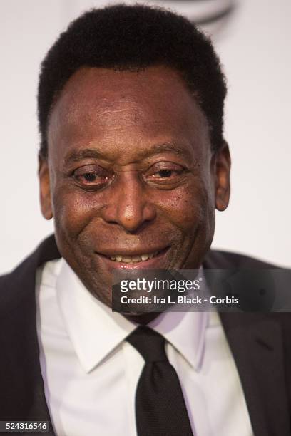 Retired soccer player Pele talks to reporters on the red carpet at the world premiere of 'Pele: Birth of a Legend' during the 2016 Tribeca Film...