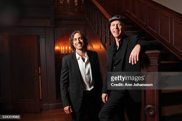 Co-creators Brad Falchuk, left, and Ryan Murphy pose for photographs on the set of "American Horror Story" at Paramount Studios in Los Angeles,...