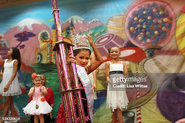 Age 8, being crowned as the Ultimate Glitz winner at the Big Top Pageant at the Holiday Inn in Harrisburg, Pennsylvania on August 12, 2012. Mary has...