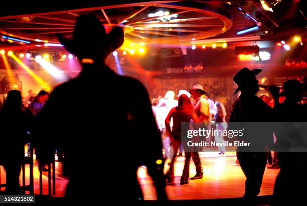 Ladies night" at the wagon Wheel, Austin,Texas, USA. Honky Tonks are dancehalls in Texas, men and women come to dance, drink socialise in a...