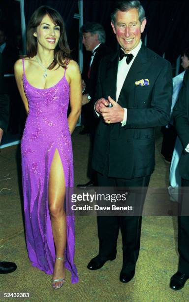 Actress Elizabeth Hurley and Prince Charles attend the De Beers/Versace 'Diamonds are Forever' celebration at Syon House on June 09, 1999 in London.