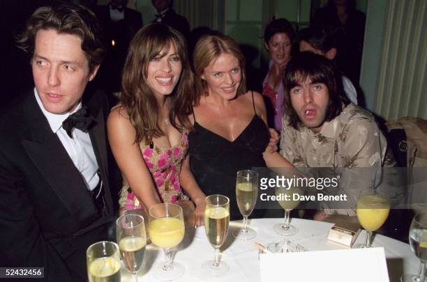 Actors Hugh Grant, Elizabeth Hurley, Patsy Kensit and Oasis lead singer Liam Gallagher attend the premiere of 'Mickey Blue Eyes' after party on...