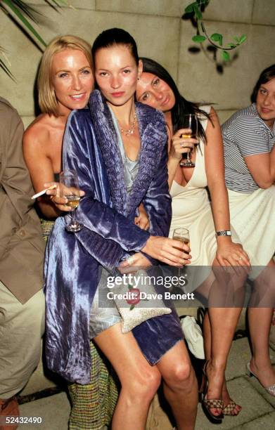 Meg Mathews, Kate Moss and Fran Cutler attend a Vogue Magazine party held at the Lisson Gallery on May 20, 1998 in London. .