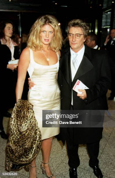 Model Rachel Hunter and husband singer Rod Stewart attend the UK premiere of the movie 'Evita' at the Empire, Leicester Square on December 20, 1996...