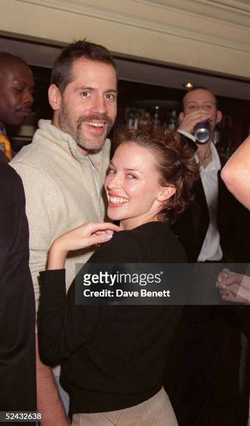 Singer Kylie Minogue and boyfriend Stephane Sednaoui attend 'Gypsey Passion' at the Royal Albert Hall on October 10, 1996 in London.