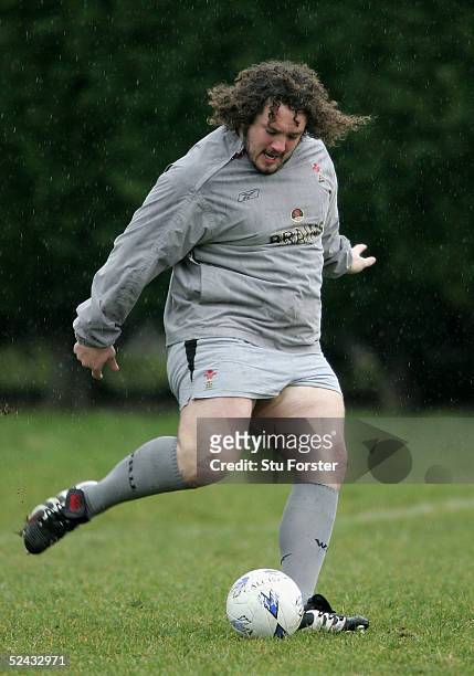 Wales forward Adam Jones shows off his round ball skills during Wales Rugby Union Training at Sophia Gardens on March 16, 2005 in Cardiff, Wales.
