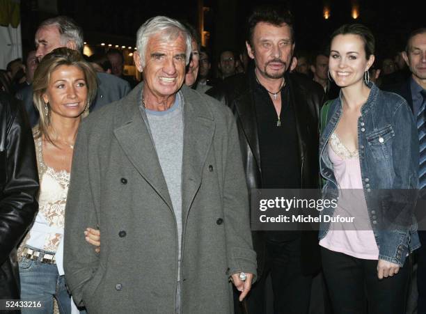 Jean Paul Belmondo and his wife Natty and singer Johnny Hallyday and his wife Laetitia attend the launch party at the night club "L'Etoile" to launch...