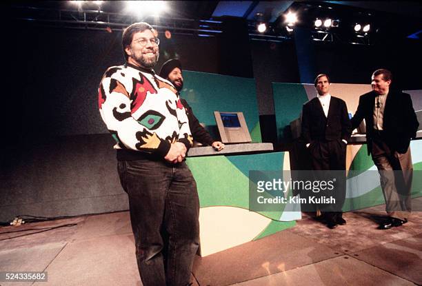 Inventor of the Apple computer, Steve Wozniak, with Steve Jobs and Gilbert Amelio, during the MACWorld Expo Keynote Speech.