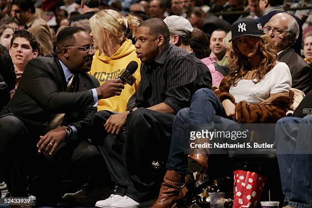 Jay Z and Beyonce attend the game between the Miami Heat and the New Jersey Nets on March 3, 2005 at the Continental Airlines Arena in East...