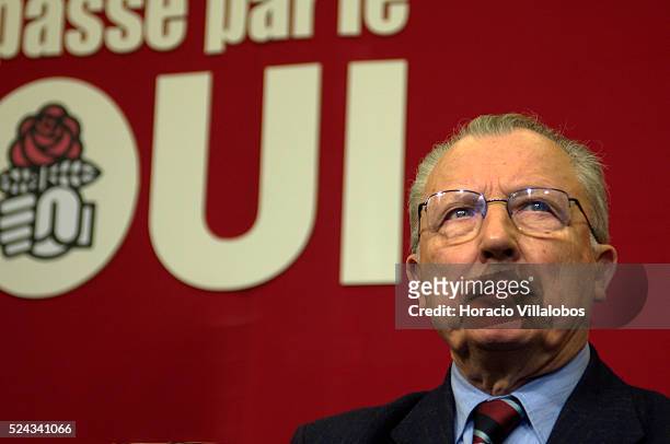 Former European Commission chief Jacques Delors listens to speeches at Socialist Party headquarters during a committee meeting to promote the 'yes'...