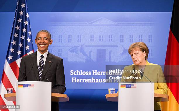 President Barack Obama and German Chancellor Angela Merkel are pictured during a news conference at the Herrenhausen Palace in Hanover, Germany on...