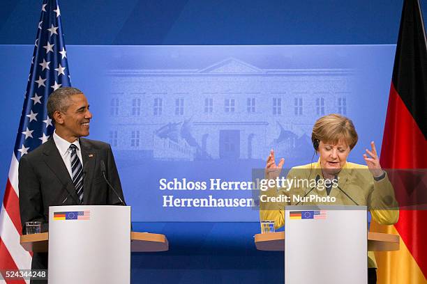 President Barack Obama and German Chancellor Angela Merkel are pictured during a news conference at the Herrenhausen Palace in Hanover, Germany on...