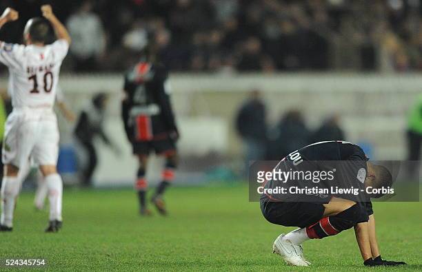 Guillaume Hoarau looks dejected during the French Ligue 1 soccer match between Paris Saint Germain and Valenciennes FC.