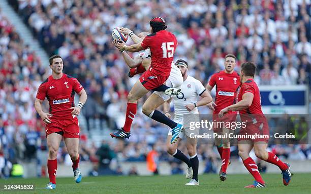 Mike Brown takes the ball from Leigh Halfpenny defence during the England vs Wales rugby match, RBS Six Nations Championship at Twickenham Stadium,...