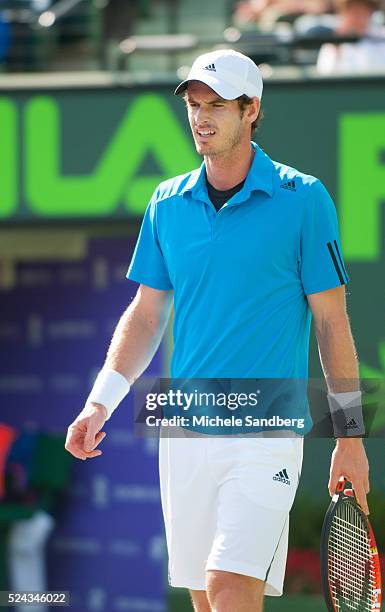 Andy Murray questions a point against Novak Djokovic of Serbia during their match on Day 10