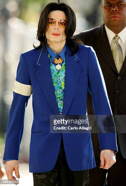 Singer Michael Jackson arrives at Santa Maria Superior Court before testimony in his child molestation trial March 16, 2005 in Santa Maria,...