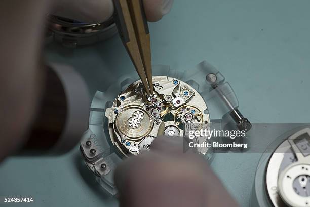 Watchmaker assembles a Zeitwerk Striking Time luxury wristwatch inside the A. Lange & Soehne factory, operated by Cie. Financiere Richemont SA, in...