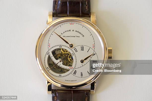 Richard Lange Tourbillion "Pour le Merite" luxury wristwatch in pink gold sits on display inside the A. Lange & Soehne factory, operated by Cie....