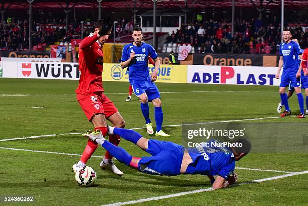 Abd Hatem Elhamed of Dinamo Bucharest L and Marko Momcilovic of CS Pandurii Targu Jiu L in action during the League Cup Adeplast game between FC...