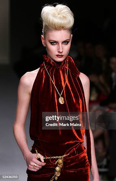 Model walks the runway at Eduardo Lucero Fall 2005 show at Mercedes Benz Fashion Week at Smashbox Studios on March 16, 2005 in Culver City,...