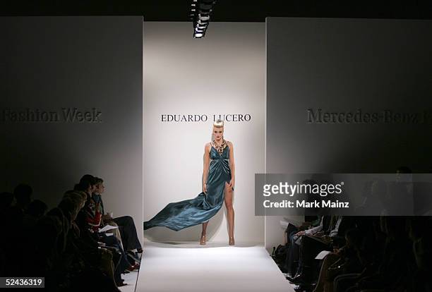Model walks the runway at the Eduardo Lucero Fall 2005 show at Mercedes Benz Fashion Week at Smashbox Studios on March 16, 2005 in Culver City,...