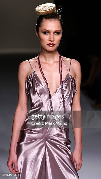 Model walks the runway at Eduardo Lucero Fall 2005 show at Mercedes Benz Fashion Week at Smashbox Studios on March 16, 2005 in Culver City,...