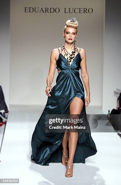 Model walks the runway at the Eduardo Lucero Fall 2005 show at Mercedes Benz Fashion Week at Smashbox Studios on March 16, 2005 in Culver City,...