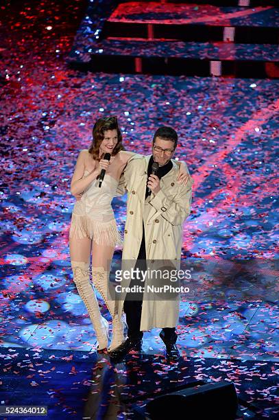 Leatitia Casta and Fazio attend the opening night of the 64rd Sanremo Song Festival at the Ariston Theatre on February 18, 2014 in Sanremo, Italy.