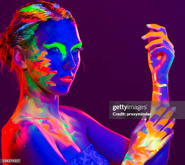 Glow In The Dark Face Paint Photos and Premium High Res Pictures ...