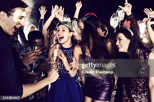 Group of friends dancing and having fun together Group of friends dancing and having fun together
