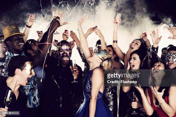 group of friends dancing and having fun together - nightclub foto e immagini stock