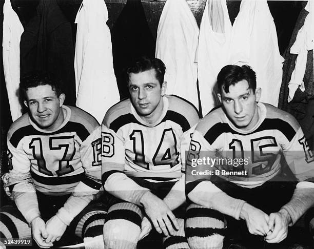 Canadian professional hockey players and childhood friends Bobby Bauer , Woody Dumart , and Milt Schmidt of the Boston Bruins' legendary 'Kraut Line'...