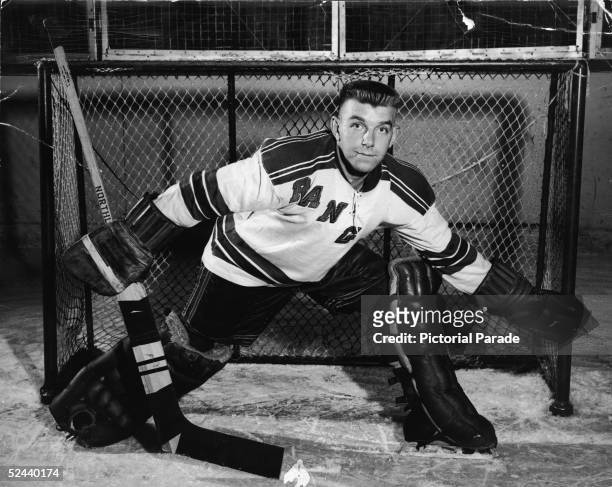 Canadian professional hockey player Lorne 'Gump' Worsley of the New York Rangers poses in the goal, 1950s.